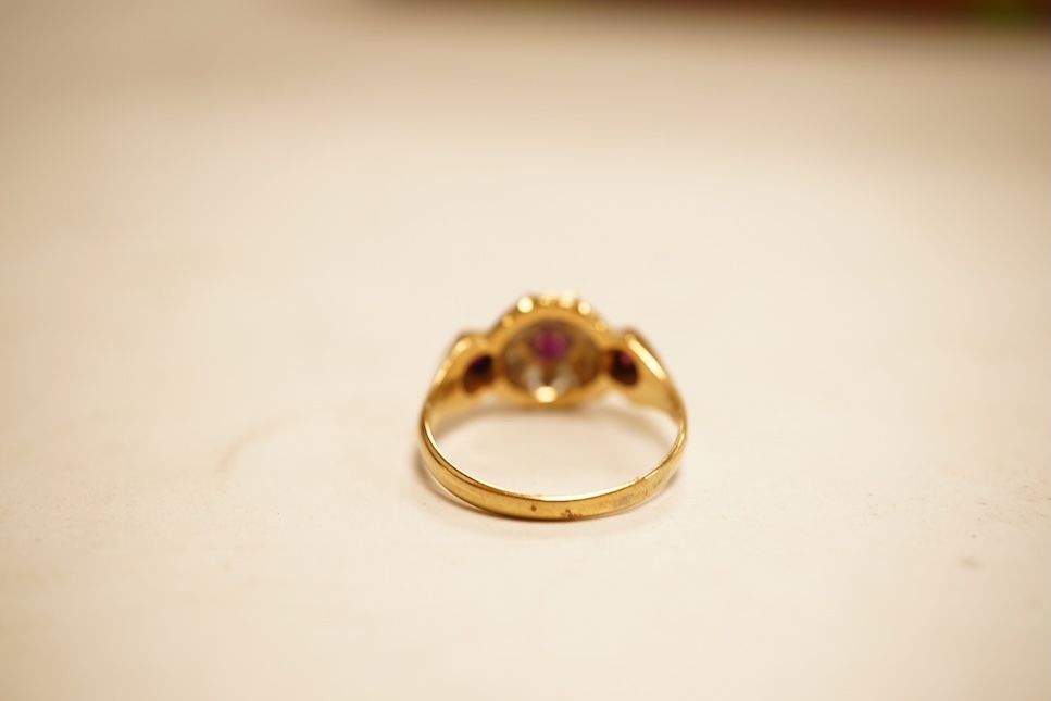 An 18ct, plat and illusion set solitaire diamond ring, size P, gross weight 2.4 grams.